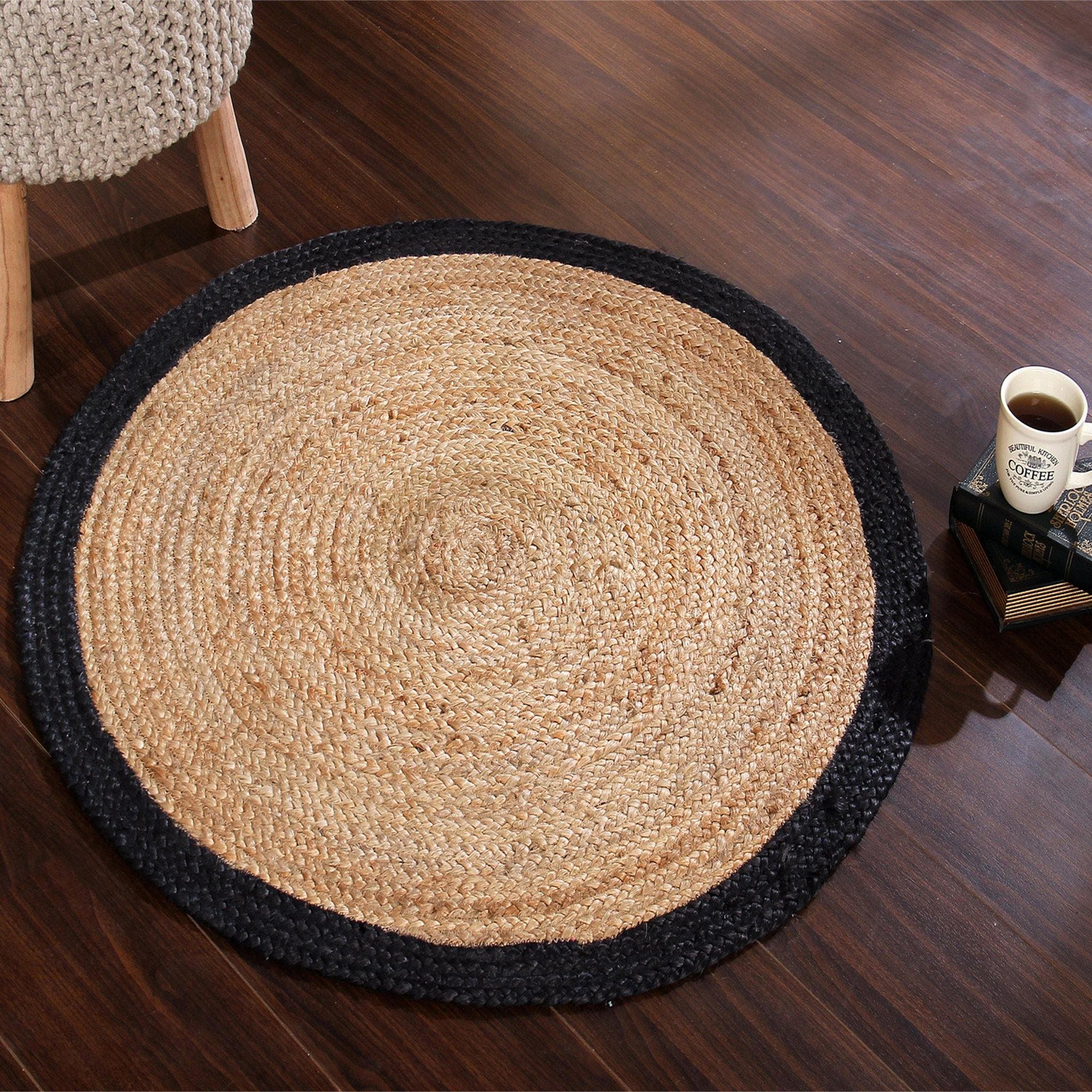 NATURAL JUTE BRAIDED RUG WITH BLACK BORDER